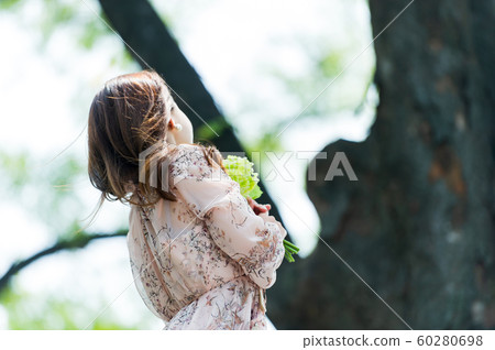 The look of a beautiful Korean woman, a park walk The look of a beautiful Korean woman, a park walk 60280698