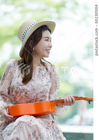 The look of a beautiful Korean woman, a park walk The look of a beautiful Korean woman, a park walk 60280984