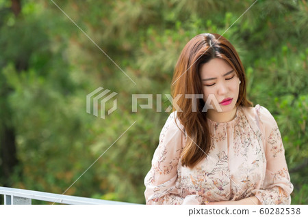 The look of a beautiful Korean woman, a park walk The look of a beautiful Korean woman, a park walk 60282538