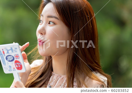 The look of a beautiful Korean woman, a park walk The look of a beautiful Korean woman, a park walk 60283852