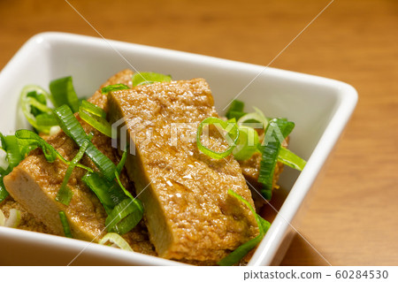 A simmered dish of Jakoten (a specially made fish paste product from Nanyo, Ehime Prefecture). A simmered dish of Jakoten (a specially made fish paste product from Nanyo, Ehime Prefecture). 60284530