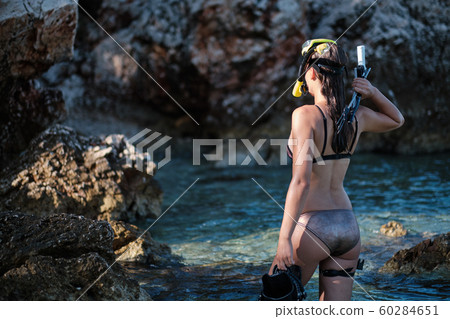 Aqua woman diver spearfishing gun. Aqua woman diver spearfishing gun. 60284651