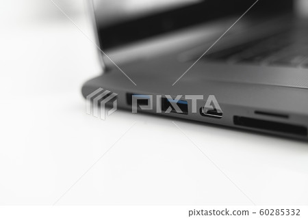 The USB adapter under the Type-C connector for laptop. Multiport station for laptop with multiple different ports. USB to USB Type-C Hub Converter. Gadgets for use a modern laptop. 60285332