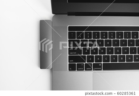 The USB adapter under the Type-C connector for laptop. Multiport station for laptop with multiple different ports. USB to USB Type-C Hub Converter. Gadgets for use a modern laptop. 60285361