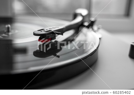Vinyl turntable on a white background. Retro audio equipment for vinyl disk. 60285402
