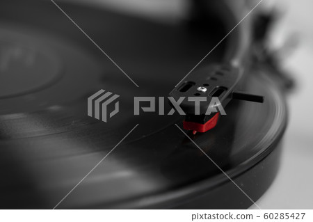 Vinyl turntable on a white background. Retro audio equipment for vinyl disk. 60285427