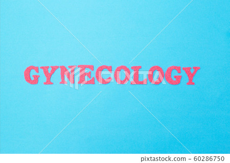 Gynecology inscription in red letters on a blue background. The concept of female diseases of the reproductive organs. surgical treatment of diseases of the reproductive female system Gynecology inscription in red letters on a blue background. The concept of female diseases of the reproductive organs. surgical treatment of diseases of the reproductive female system 60286750