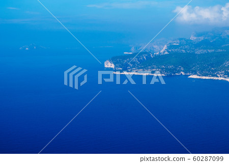 Beautiful sea view with smooth water surface and blue sky. Copy space. 60287099