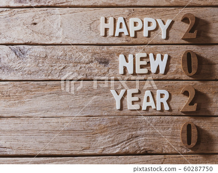 happy new year 2020 alphabet on old wood background happy new year 2020 alphabet on old wood background 60287750