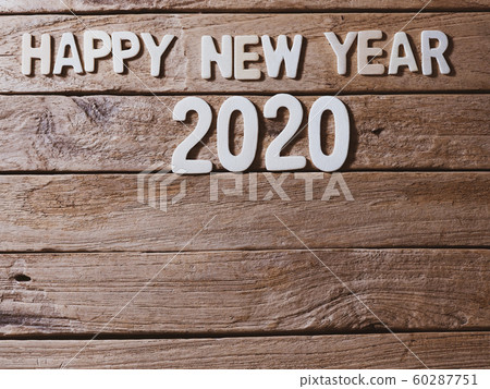 happy new year 2020 alphabet on old wood background happy new year 2020 alphabet on old wood background 60287751