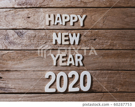 happy new year 2020 alphabet on old wood background 60287753