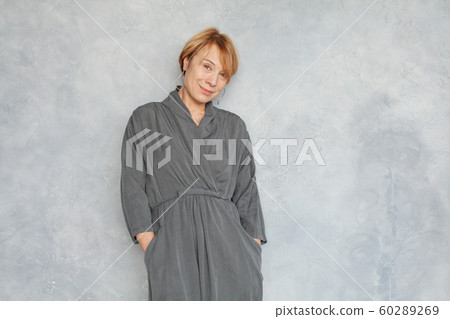 Beautiful mature woman with short ginger hair Beautiful mature woman with short ginger hair 60289269
