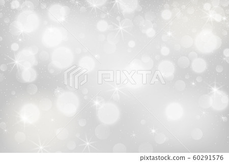 Silver bokeh background. Christmas glowing lights with sparkles. Holiday decorative effect. Silver bokeh background. Christmas glowing lights with sparkles. Holiday decorative effect. 60291576