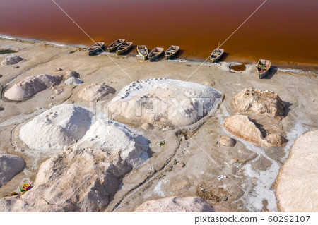 Aerial view of the small boats for salt collecting Aerial view of the small boats for salt collecting 60292107