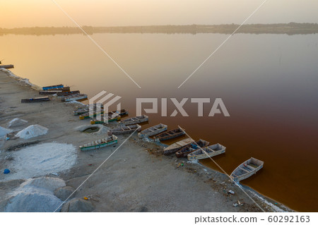 Aerial view of the small boats for salt collecting Aerial view of the small boats for salt collecting 60292163