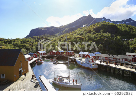 Lofoten Islands, Norway, Nusfjord harbor with colorful fishing boats 60292882