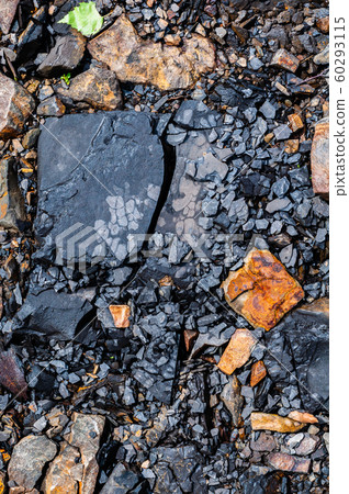 Background from natural cracked stones, layered black stone Background from natural cracked stones, layered black stone 60293115