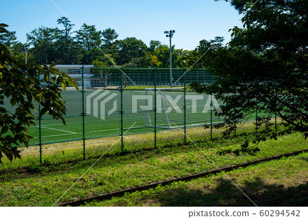 Soccer court over the fence Soccer court over the fence 60294542