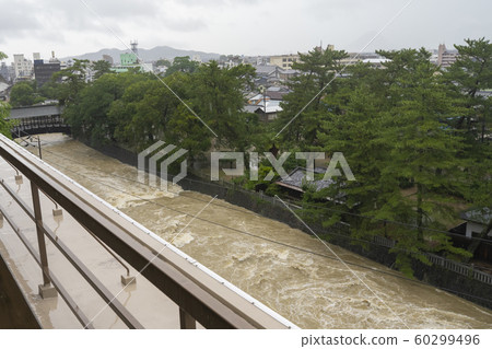 A tremendous muddy flow in heavy rain in Shikoku A tremendous muddy flow in heavy rain in Shikoku 60299496