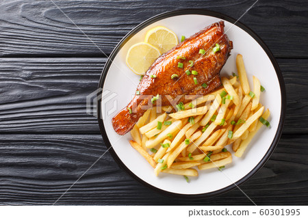 Whole cooked Sebastes fish with french fries and Whole cooked Sebastes fish with french fries and 60301995