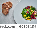 Pumpkin and spinach vegeterian healthy salad 60303159
