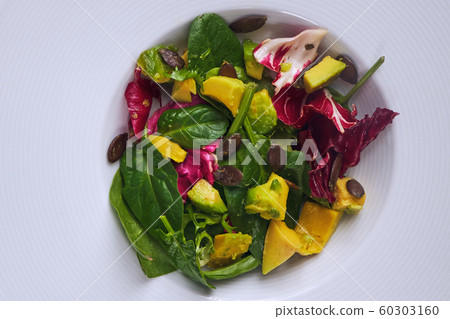 Pumpkin and spinach vegeterian healthy salad 60303160