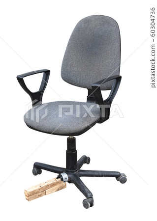Old office chair with a piece of wood instead of a Old office chair with a piece of wood instead of a 60304736