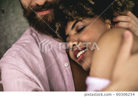 Close up happy male and female beloved couple 60306254