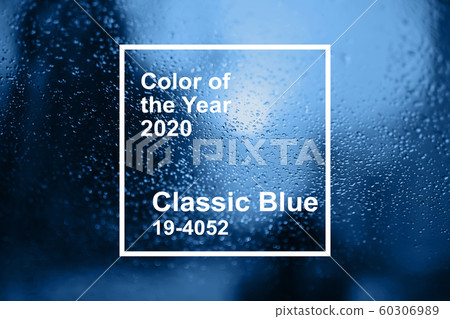Main color trend 2020 classic blue pantone. raindrops on a background of glass Main color trend 2020 classic blue pantone. raindrops on a background of glass 60306989