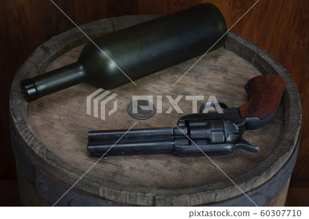 Old western revolver with cartridges and silver Old western revolver with cartridges and silver 60307710