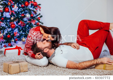 a guy with a girl open Gifts Christmas new year a guy with a girl open Gifts Christmas new year 60307772