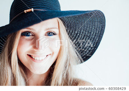 beautiful girl in a hat with a brim fashion beautiful girl in a hat with a brim fashion 60308429