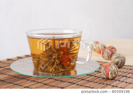 Green tea with lily flower Green tea with lily flower 60309196