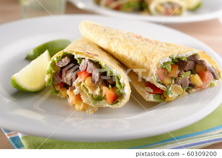 Tortilla wraps with meat and vegetables Tortilla wraps with meat and vegetables 60309200