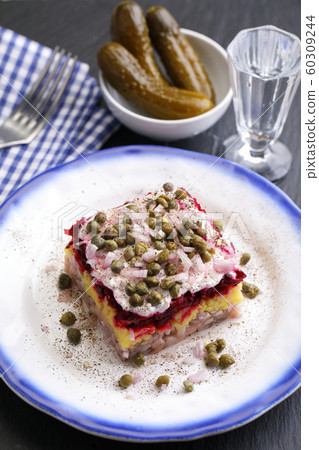Dressed herring salad 60309244