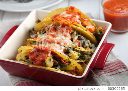 Tacos with beef and vegetables 60309265