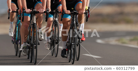 Cycling competition, cyclist athletes riding a race Cycling competition, cyclist athletes riding a race 60312799