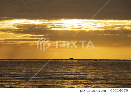 Silhouette of a fishing boat sailing on the sea off Jeju Island Silhouette of a fishing boat sailing on the sea off Jeju Island 60314079