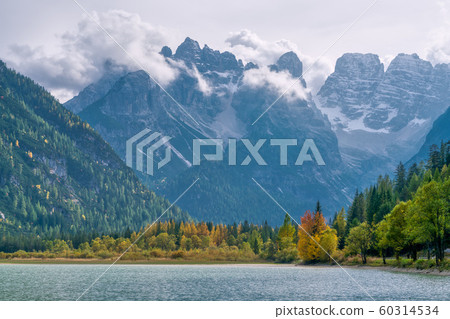 Early autumn view of dolomites mountain and Durrensee lake near South Tyrol, Italy Early autumn view of dolomites mountain and Durrensee lake near South Tyrol, Italy 60314534