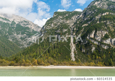 Early autumn view of dolomites mountain and Durrensee lake near South Tyrol, Italy Early autumn view of dolomites mountain and Durrensee lake near South Tyrol, Italy 60314535