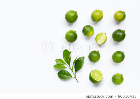 Fresh limes with leaves isolated on white Fresh limes with leaves isolated on white 60316415