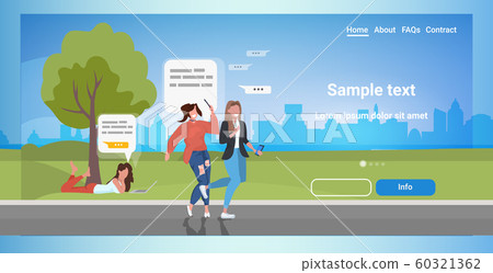 people using chatting apps on digital devices social network speech chat bubble communication concept women relaxing in park horizontal full length copy space 60321362