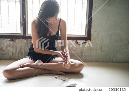 Addicted sexy woman  inject heroin drug in house 60330183