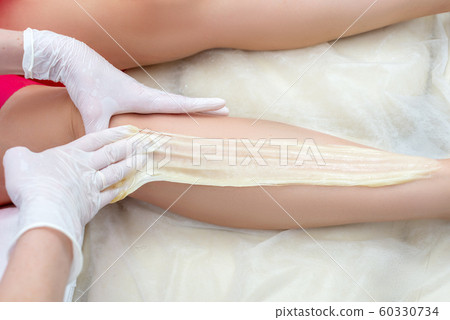 beautician hair removal procedure on the client's beautician hair removal procedure on the client's 60330734