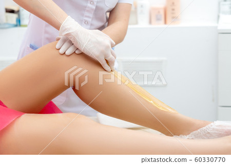 beautician hair removal procedure on the client's beautician hair removal procedure on the client's 60330770
