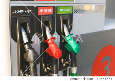 Modern dispensers at petrol gas station for cars 60331663