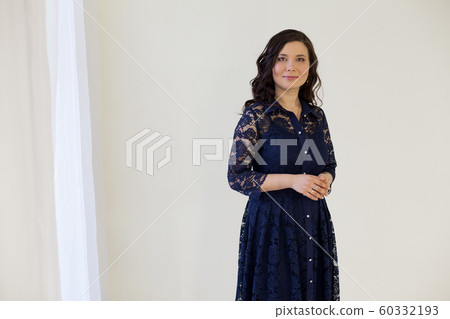 Beautiful fashionable asian woman in blue dress Beautiful fashionable asian woman in blue dress 60332193