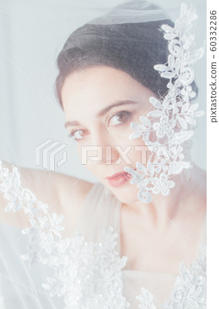 brunette woman in gray wedding gown white brunette woman in gray wedding gown white 60332286