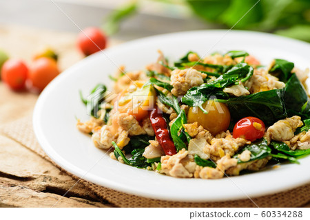 Northern Thai food (Pad Pak Chiang Da), stir fried gurmar leaf with egg 60334288