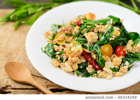 Northern Thai food (Pad Pak Chiang Da), stir fried gurmar leaf with egg 60334289